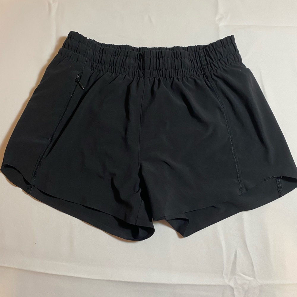 Black athleta kids running shorts
